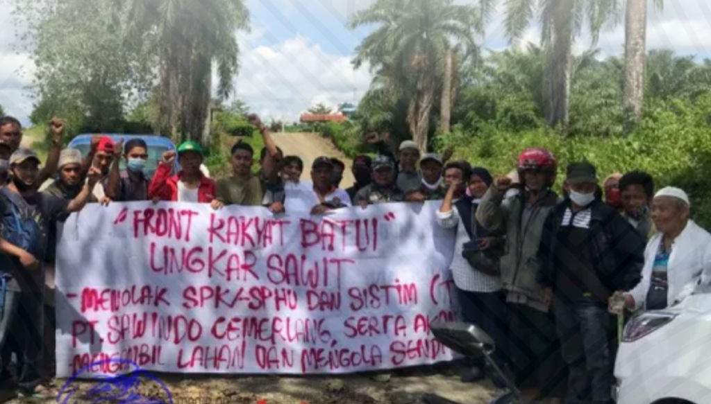 Wahana Lingkungan Hidup (WALHI) menyerukan hentikan kriminalisasi pada petani pemilik lahan di Lobo KM 9, dusun I, Ondo-ondolu 1, Kecamatan Batui, Kabupaten Banggai, Sulawesi Tengah. (Foto: WALHI)
