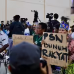 Aksi solidaritas Merauke mendesak Komnas HAM. (Pusaka Bentala Rakyat)
